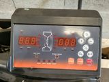 an image of a digital clock on top of a machine