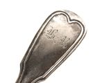 a spoon that has a spoon on it with writing on it