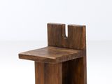 a small wooden table with a small table on top of it