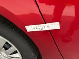 a sticker on the side of a red car