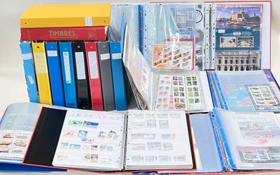 many different types of binders and books on the table