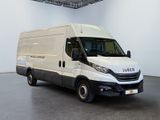 a white van that is parked inside of a building