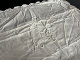 an image of a piece of cloth with a monogram on it