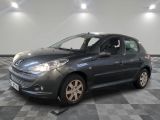 a picture of a small grey car in a showroom