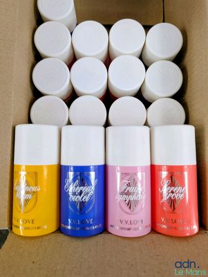 a box full of different colors of nail polish in it