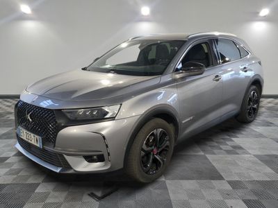 a grey 2021 dsx suv parked in a showroom