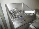 a stainless steel sink with a faucet in it