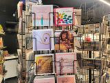 many cards on display in the store for sale