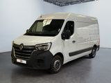 la photo d'une camionnette blanche garée dans un garage