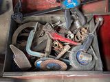 a box full of tools sitting on the floor