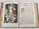 an open book with a picture of jesus and other figures on it