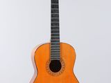 an image of a guitar hanging on a wall with a white background