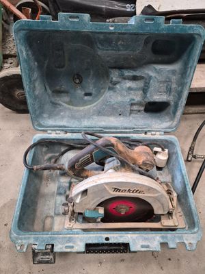 a tool box that has a circular saw in it