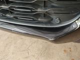 a close up of the front bumper of a car