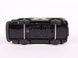 a black toy train on a white background