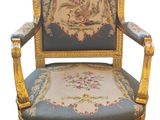an image of a chair with a blue and gold upholstered seat
