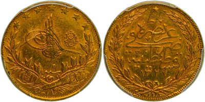 two gold sovereigns, one with a bird and the other with a crown