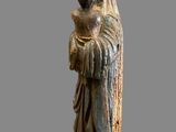 an image of a statue of a woman holding a child