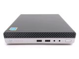 a black and silver laptop on a white surface
