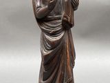 statue of a woman holding a child in her arms