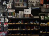a store with a lot of pens and supplies on the shelves