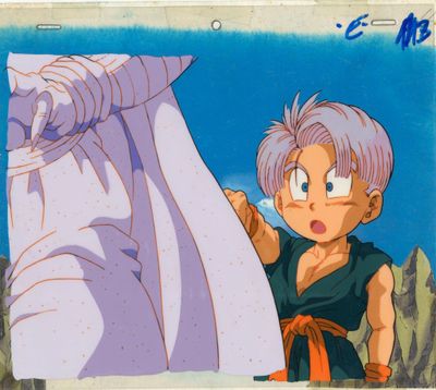 cellule d'animation représentant un jeune Gohan tenant une feuille de papier