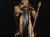 an image of a statue of a man with a dog