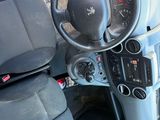 a car dashboard with a steering wheel and a dash board