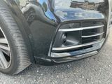a close up of the front bumper of a car