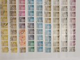 a picture of a picture of a wall with stamps on it