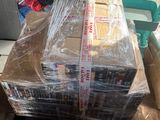 many boxes that are sitting on a table