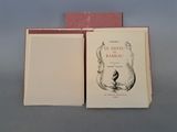an open book with a drawing of a woman on it