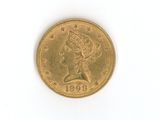 l'image d'une pièce d'or sur laquelle figure une tête de femme
