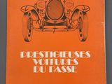 a book with an orange cover and a picture of an old car