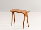 an image of a small wooden table on a white surface