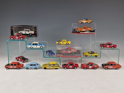 a lot of toy cars on display in a display case