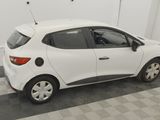 a picture of a white car parked in a garage