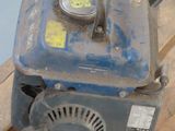 a small engine that is sitting on a pallet