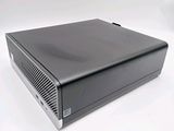 an image of a black computer on a white surface