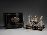 an image of a black and gold - plated bar set with wine glasses and liquor glasses
