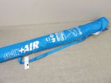 a blue umbrella that is laying on a couch