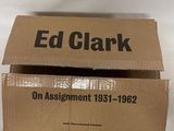 two boxes of ed clark on assignment 1933 - 1932 on a white surface