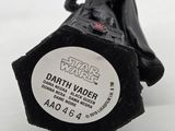 star wars darth vader action figure on a white surface