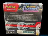 a box of pokemon cards with a black background