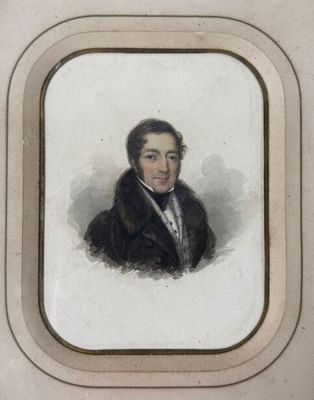 portrait d'un homme en costume-cravate, dans un cadre blanc