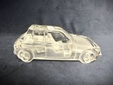 an image of a clear plastic toy car on a black background