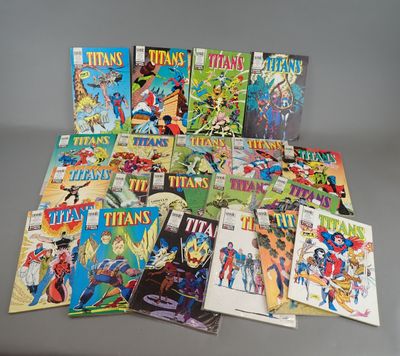 a bunch of comics sitting on top of a table next to each other