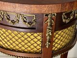 a wooden table with a basket on top of it