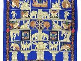 an image of a blue scarf with a picture of elephants on it