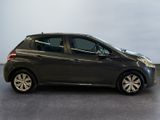 a picture of a small black car parked in a garage